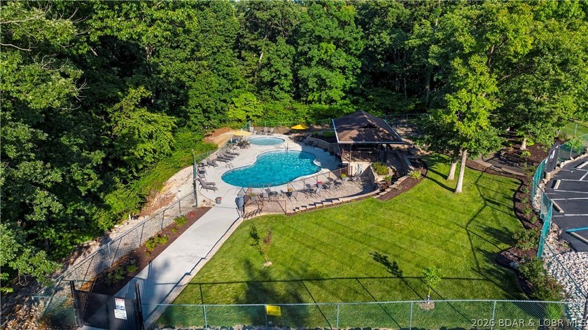 1.62-acre wooded lot in the sought-after Four Seasons community - photo 10
