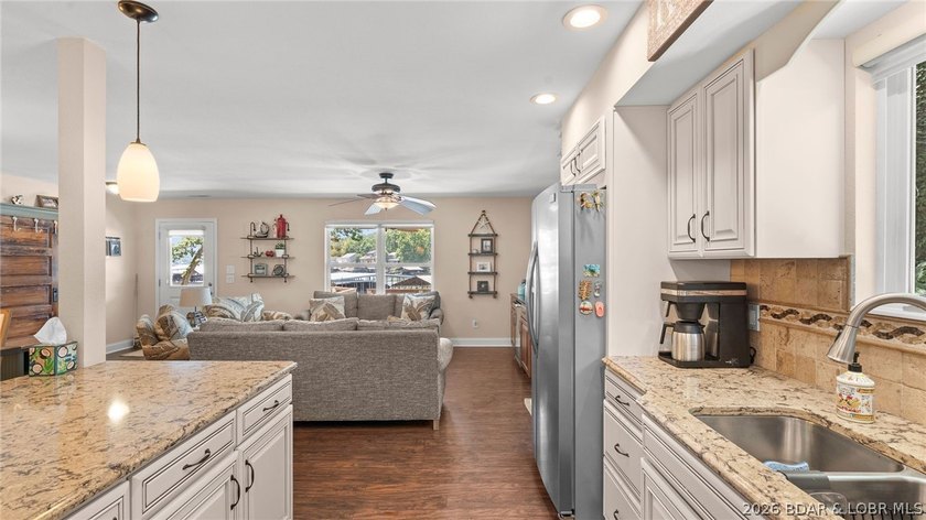 Designed with gathering in mind, this unique lake home was - photo 10