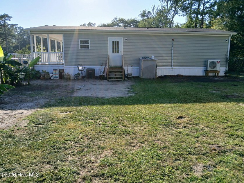 3-bedroom, 2 bath doublewide situated on approximately .47 acres - photo 3