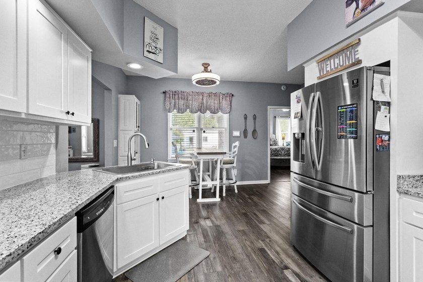 Back on the market at no fault of the sellers! This beautiful - photo 21