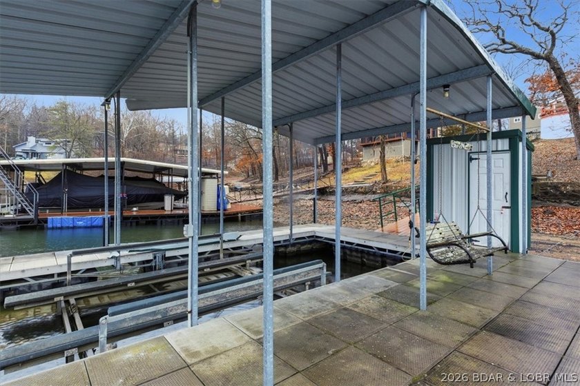 Discover this unique 2-bedroom, 1-bath lakefront cabin offering - photo 5