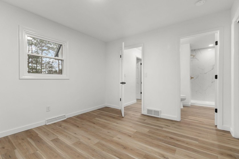 Completely updated 4-bedroom home situated on 2.9 private acres - photo 15