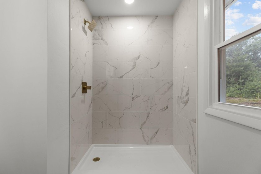 Completely updated 4-bedroom home situated on 2.9 private acres - photo 18