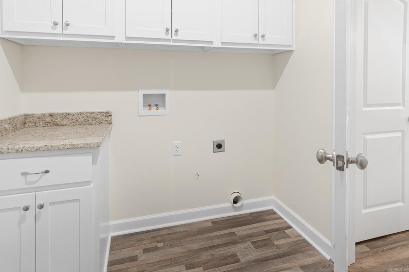 Beautiful new construction 4-bedroom, 2-bath brick home in the - photo 33