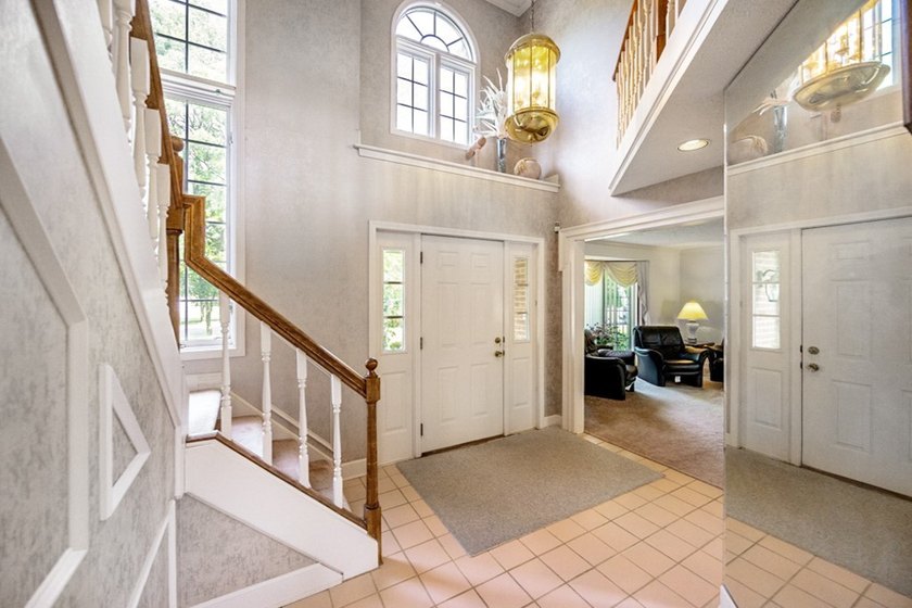 Set on nearly half an acre, this 2 story brick-front Colonial - photo 4