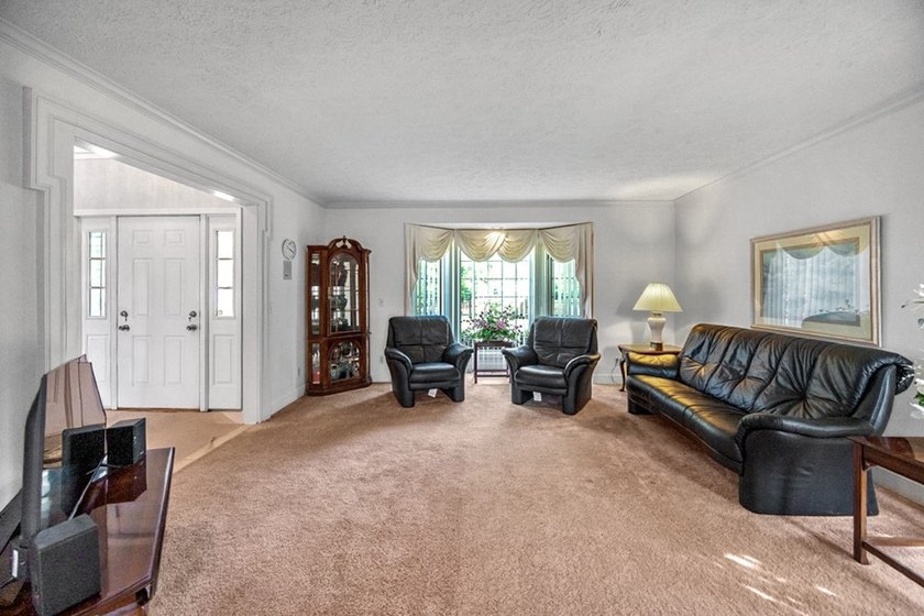 Set on nearly half an acre, this 2 story brick-front Colonial - photo 5