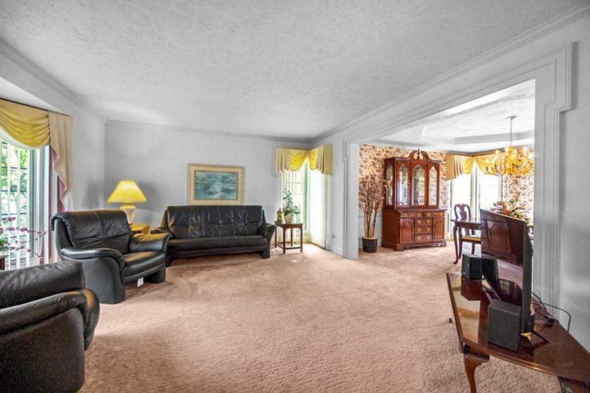 Set on nearly half an acre, this 2 story brick-front Colonial - photo 6