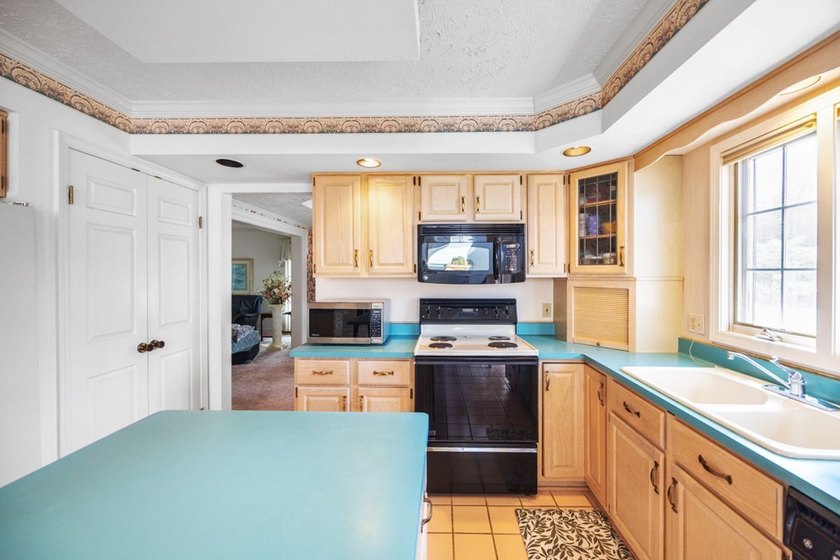 Set on nearly half an acre, this 2 story brick-front Colonial - photo 9