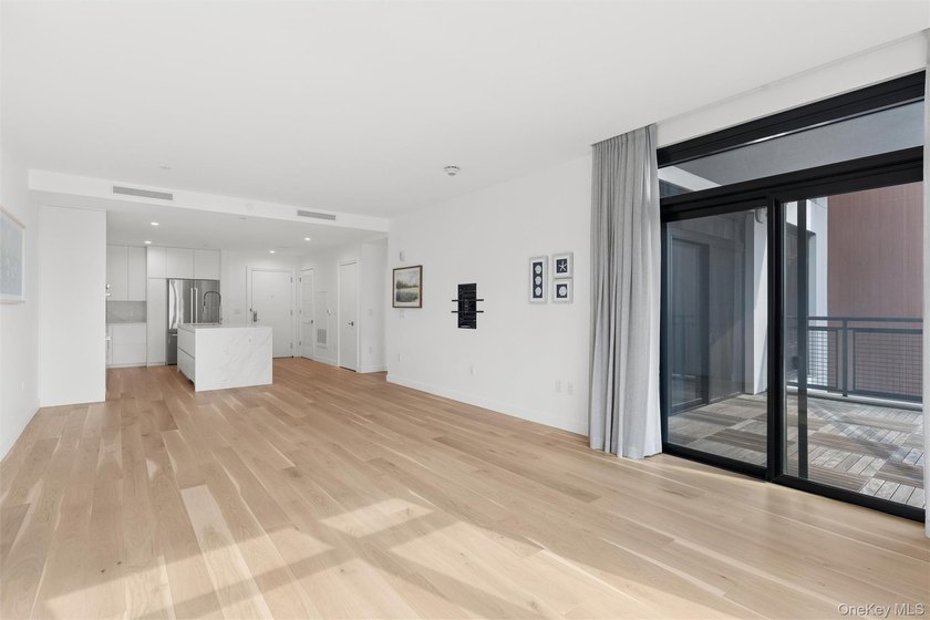 Experience elevated coastal living in this stunning one-bedroom - photo 3