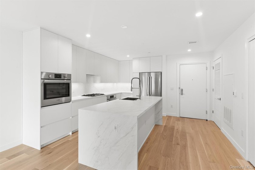 Experience elevated coastal living in this stunning one-bedroom - photo 4