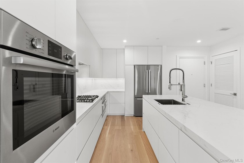 Experience elevated coastal living in this stunning one-bedroom - photo 6
