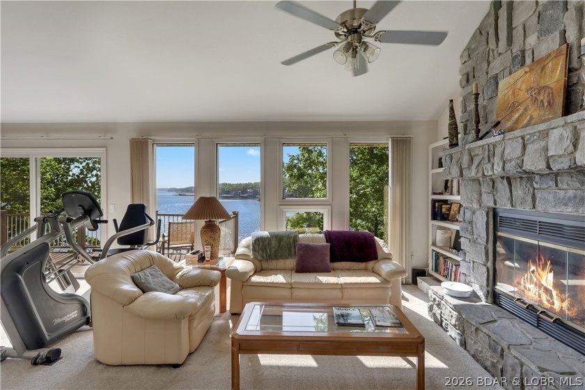 This 3-bedroom, 2-bath home on Nonsuch in Lake Ozark is now - photo 4
