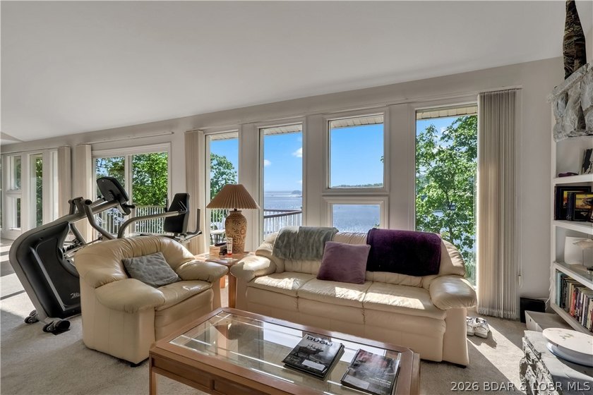 This 3-bedroom, 2-bath home on Nonsuch in Lake Ozark is now - photo 5
