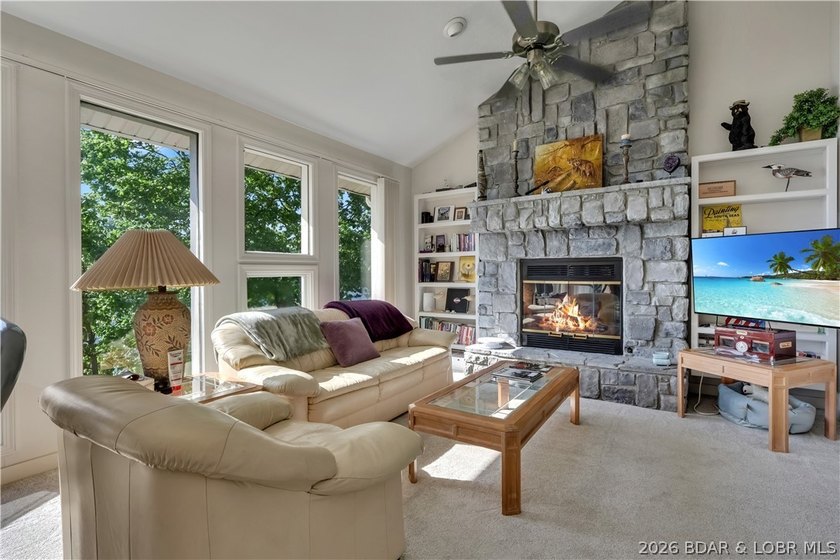 This 3-bedroom, 2-bath home on Nonsuch in Lake Ozark is now - photo 6