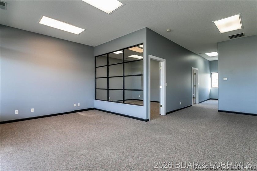 Professional office/retail building on Osage Beach Parkway with - photo 6