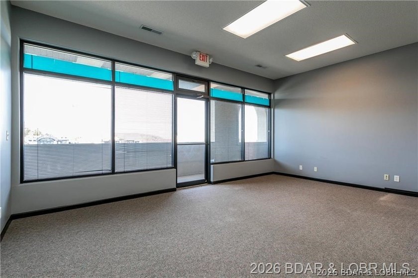 Professional office/retail building on Osage Beach Parkway with - photo 7