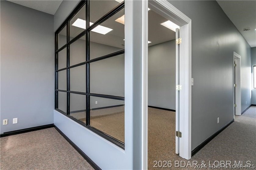 Professional office/retail building on Osage Beach Parkway with - photo 8