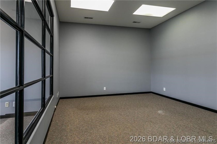 Professional office/retail building on Osage Beach Parkway with - photo 9