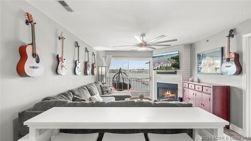 Experience luxury lake living at its finest in this - photo 5