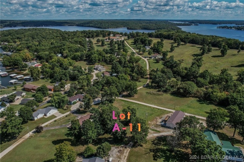 Lot A-11 in Johnsons Bay subdivision is a .41acre lot with a - photo 11