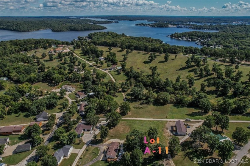 Lot A-11 in Johnsons Bay subdivision is a .41acre lot with a - photo 13