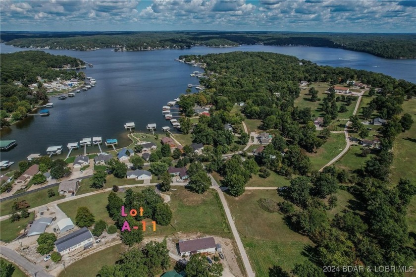 Lot A-11 in Johnsons Bay subdivision is a .41acre lot with a - photo 15
