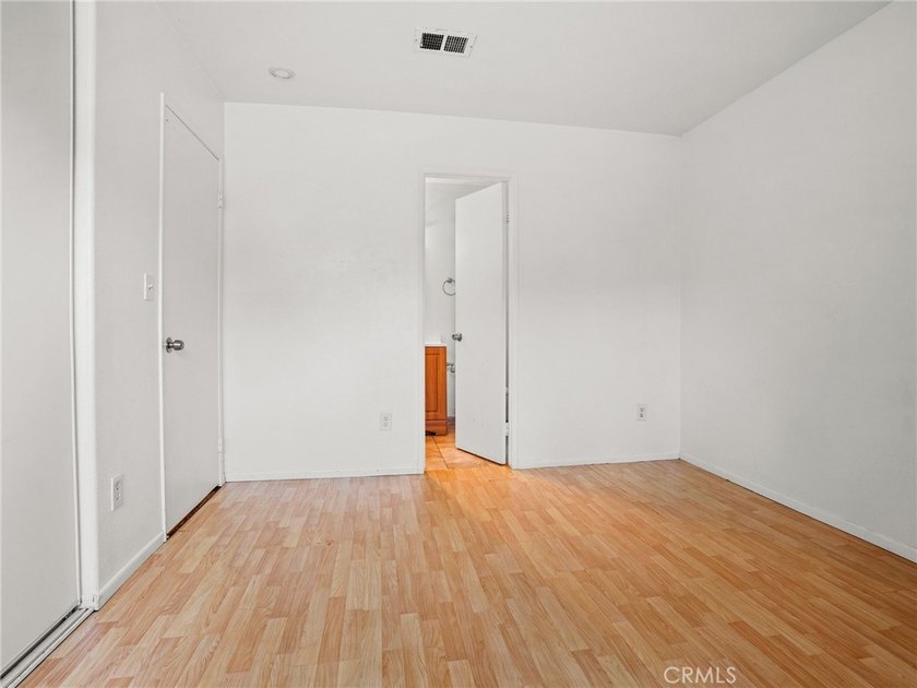 This beautifully updated 4-bedroom, 2-bathroom home with a 2-car - photo 17
