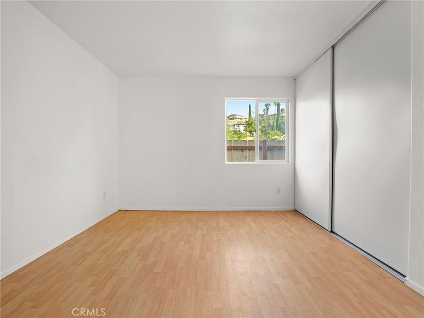 This beautifully updated 4-bedroom, 2-bathroom home with a 2-car - photo 18