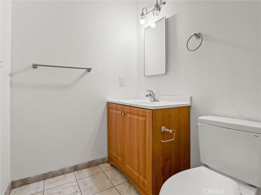 This beautifully updated 4-bedroom, 2-bathroom home with a 2-car - photo 20