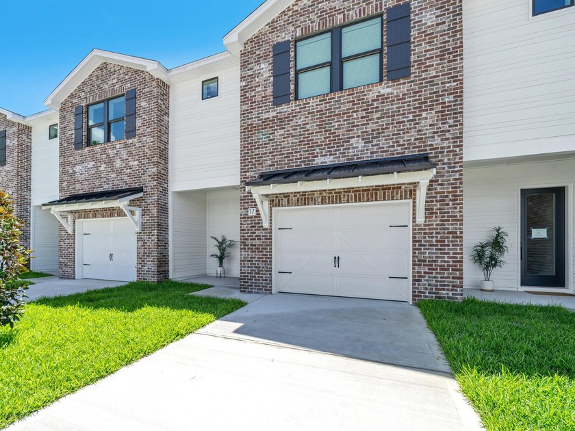 End Unit! Welcome to The Oaks, a charming neighborhood nestled - photo 30