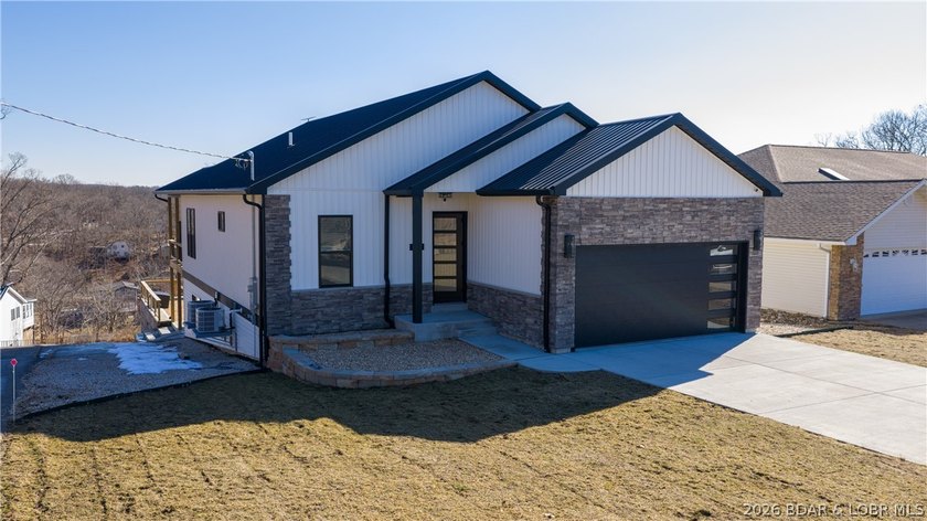 Investment potential meets lake living in this newly constructed - photo 3