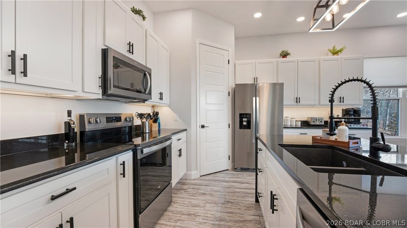 Investment potential meets lake living in this newly constructed - photo 6