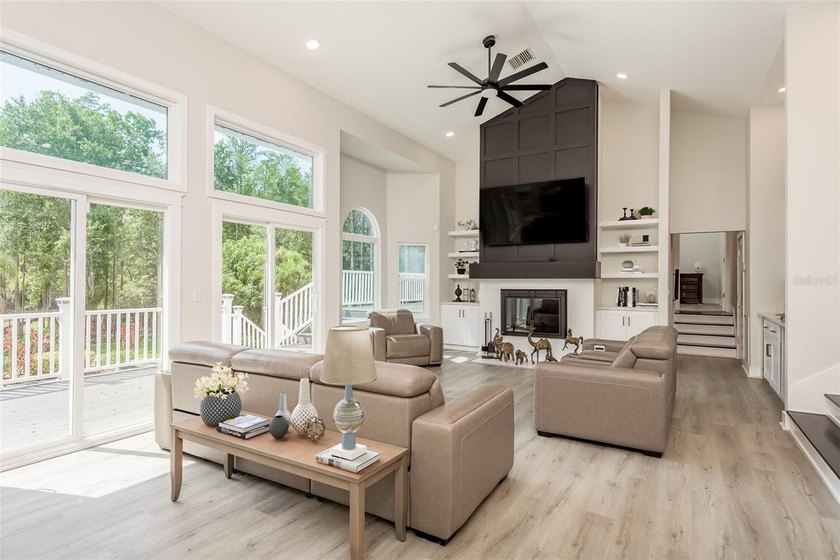 Privacy prevails on this custom home nestled on over an acre of - photo 12