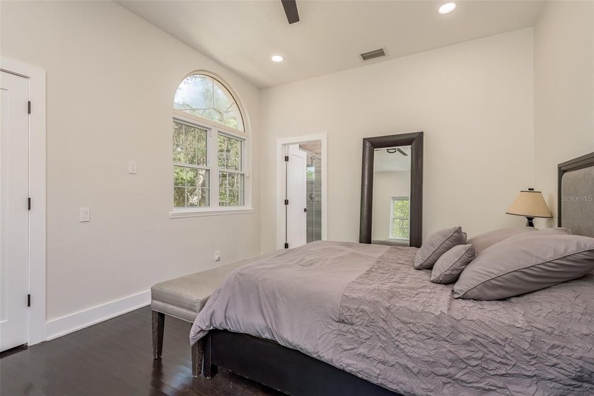 Privacy prevails on this custom home nestled on over an acre of - photo 23