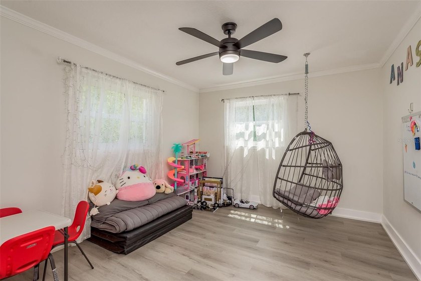 Privacy prevails on this custom home nestled on over an acre of - photo 25