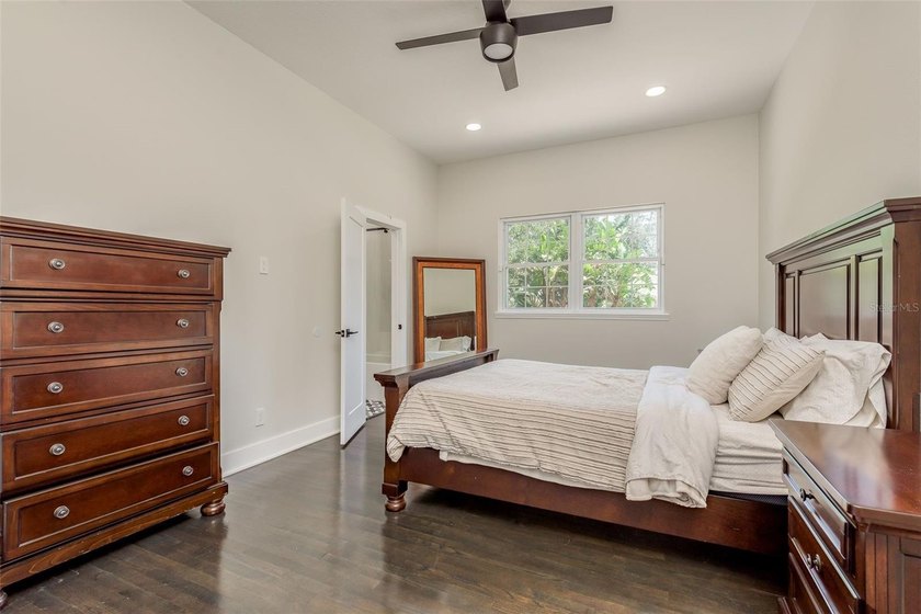 Privacy prevails on this custom home nestled on over an acre of - photo 29