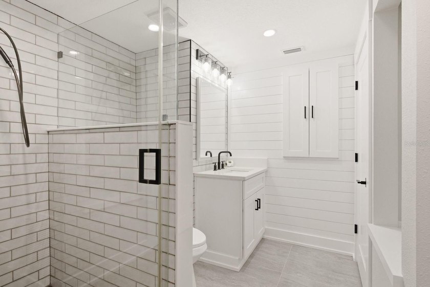 Privacy prevails on this custom home nestled on over an acre of - photo 32