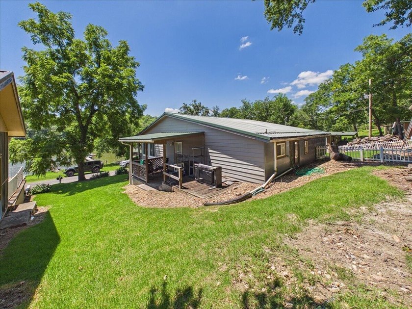 Welcome to the Lake! This home in a quiet neighborhood sits with - photo 33