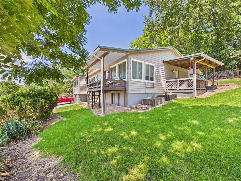 Welcome to the Lake! This home in a quiet neighborhood sits with - photo 34