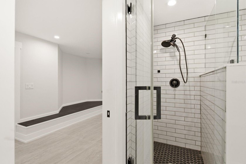 Privacy prevails on this custom home nestled on over an acre of - photo 34