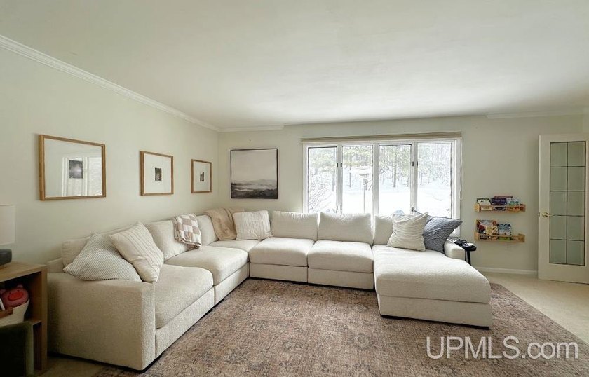 Nestled in one of Marquette's most desirable neighborhoods, this - photo 4