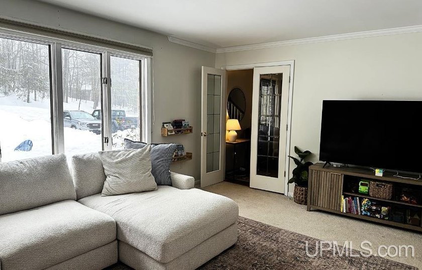 Nestled in one of Marquette's most desirable neighborhoods, this - photo 6