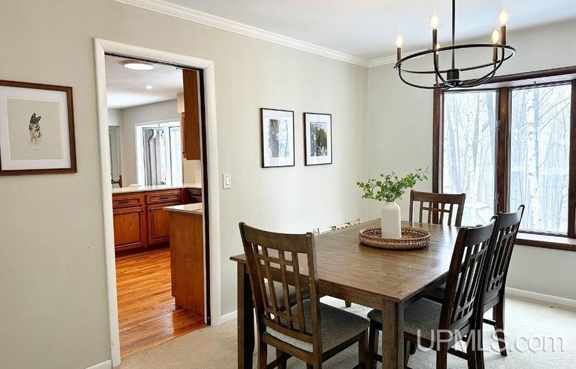 Nestled in one of Marquette's most desirable neighborhoods, this - photo 8