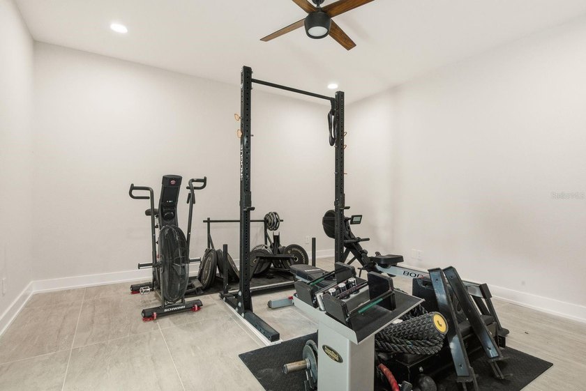 Privacy prevails on this custom home nestled on over an acre of - photo 39