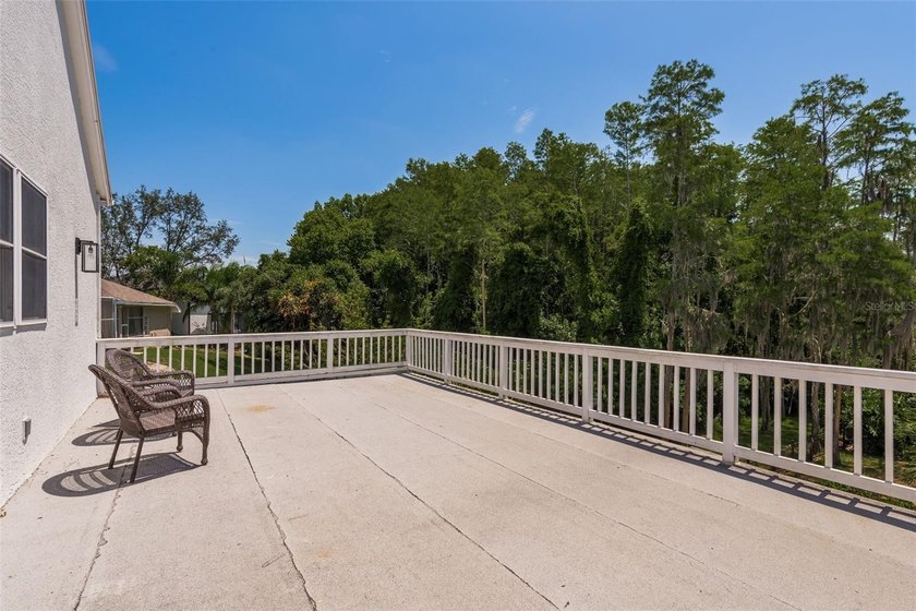 Privacy prevails on this custom home nestled on over an acre of - photo 42