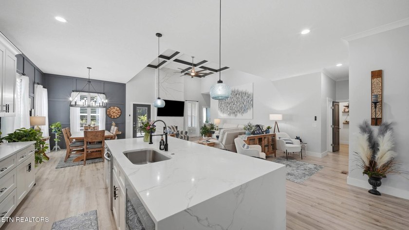 Welcome home to this beautifully designed five bedroom, two and - photo 12