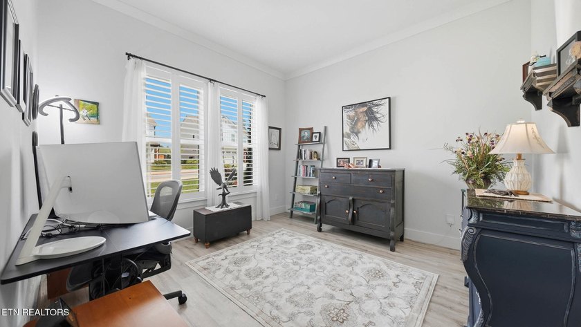 Welcome home to this beautifully designed five bedroom, two and - photo 14