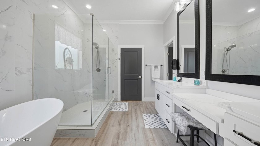 Welcome home to this beautifully designed five bedroom, two and - photo 17