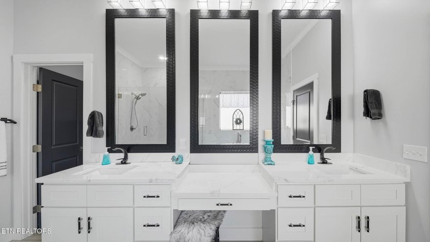 Welcome home to this beautifully designed five bedroom, two and - photo 18
