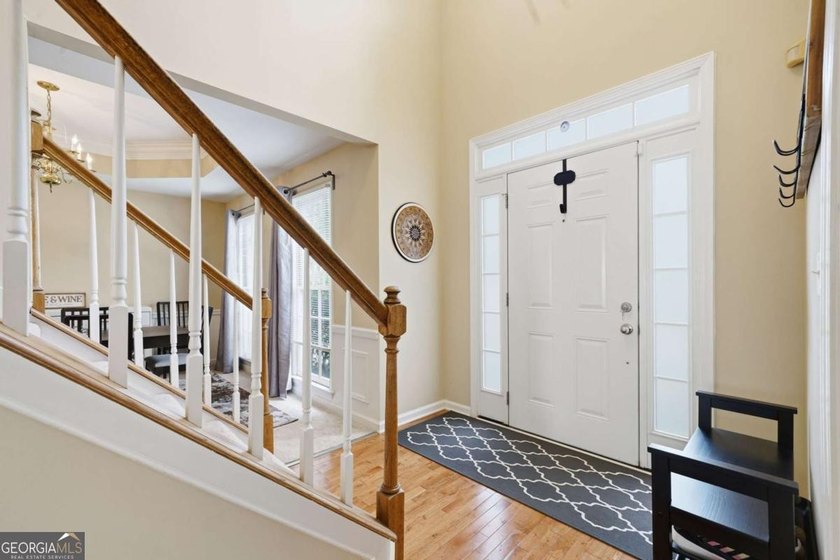 Nestled in the highly sought-after Waters Edge, this traditional - photo 3